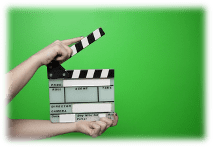 Film take starting in front of green screen